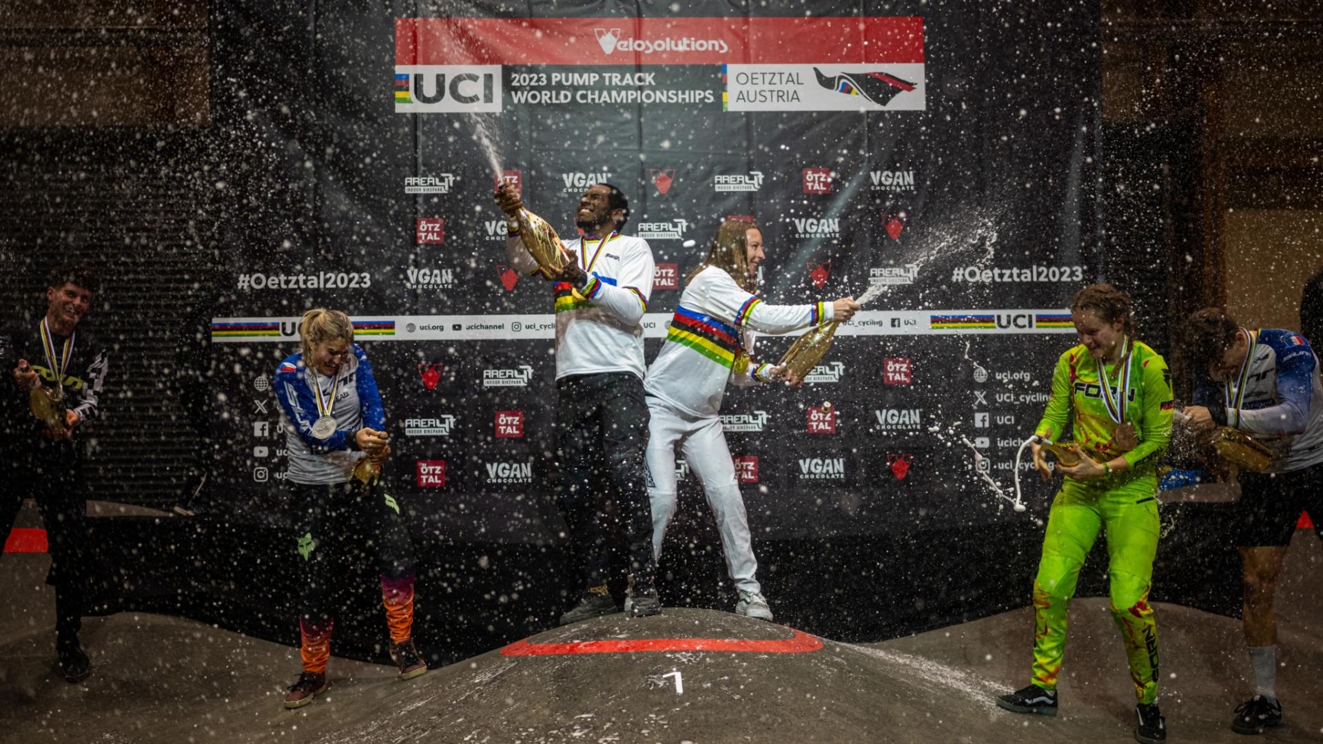 Winners celebrate the 2023 Velosolutions UCI World Championship